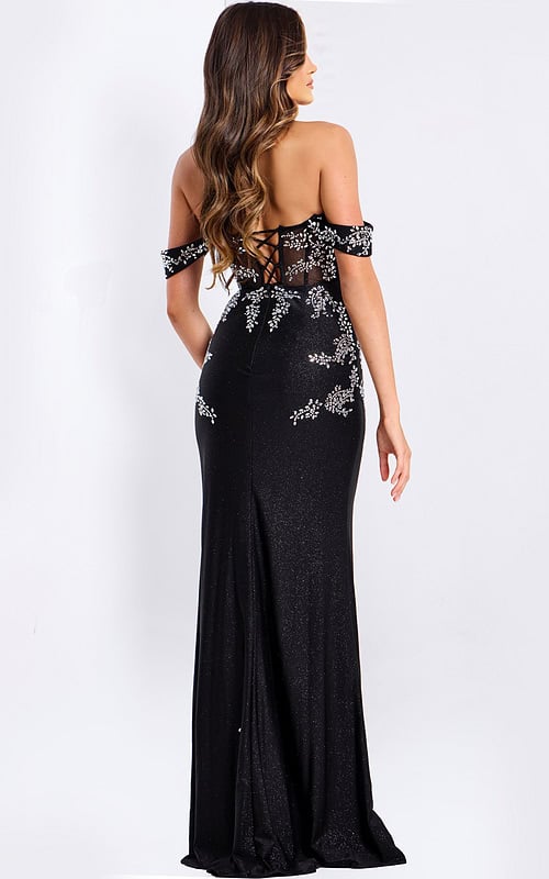 Black fitted gown with lace-up back and sparkling details