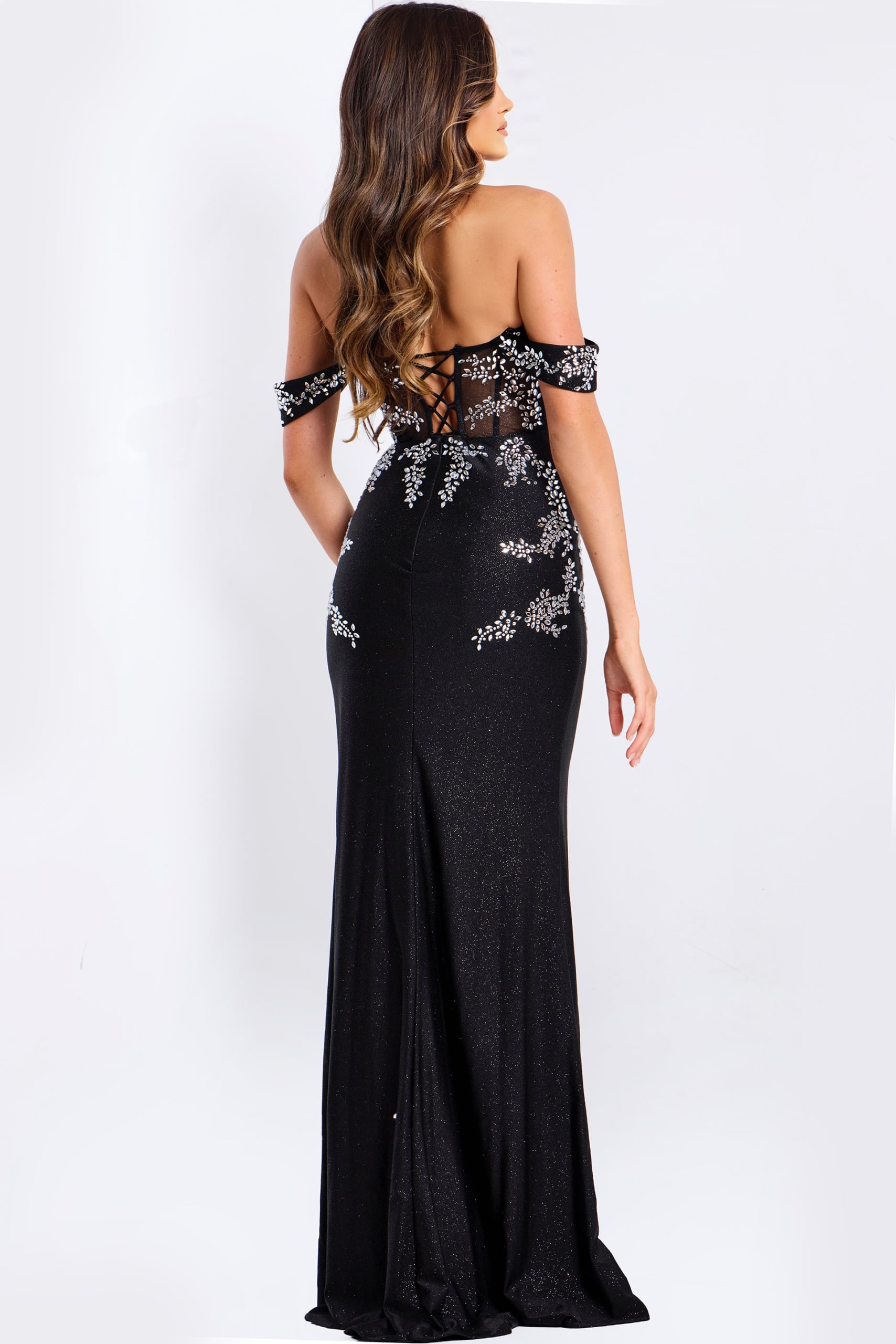 Black fitted gown with lace-up back and sparkling details