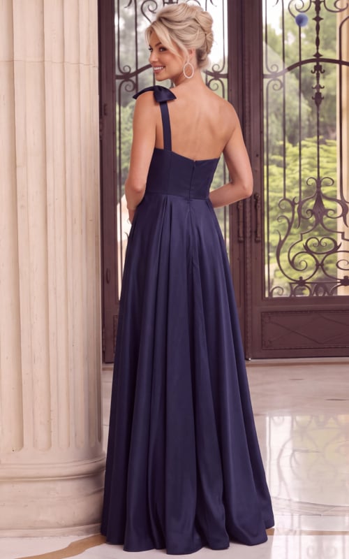Navy blue one-shoulder satin gown with statement bow and full A-line skirt