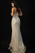 Elegant sheer gown with intricate beadwork and sculpted design
