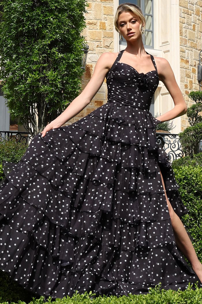 blackwhite halter polka dot tiered dress with bow bodice - front full body, skirt pulled open leg visible
