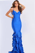 Fitted cutout evening dress featuring open back and flared ruffle skirt.