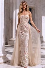 Strapless champagne prom gown featuring floral sequin embroidery