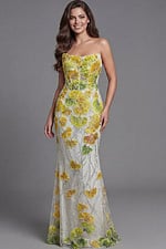 Embellished evening gown with floral appliqué and sheer cape
