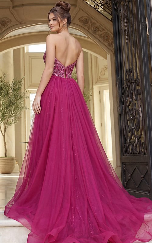 Back view of strapless beaded evening gown with low back, fitted waist, and flowing tulle skirt