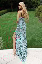 Romantic floral prom dress with intricate beadwork and long skirt