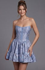 Shimmering periwinkle and silver cocktail dress designed with a reinforced bodice and architectural seams.