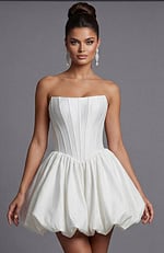 Strapless corset dress with structured bodice and voluminous bubble hem silhouette