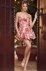 Whimsical floral cocktail dress with a structured, rosette-embellished bust and a voluminous, rounded bubble skirt.