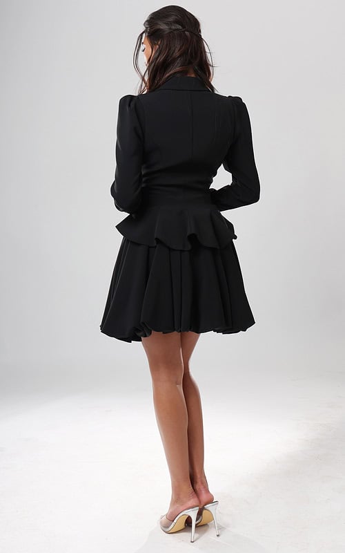 back view of black crepe double breasted blazer dress with notch lapel, gold buttons and lace cuff bubble hem, Jovani style 51602