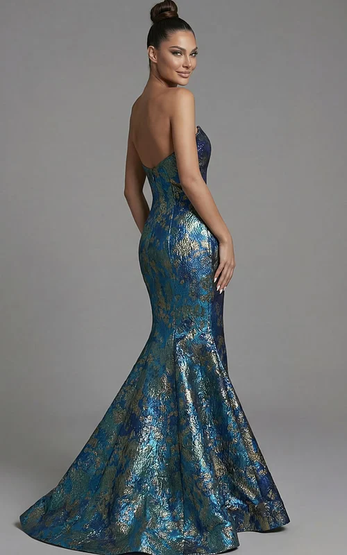 Brocade mermaid gown with fitted waist and dramatic flare back view