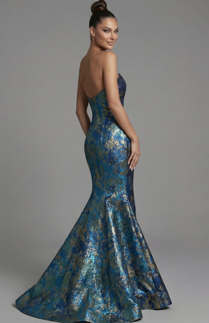 Brocade mermaid gown with fitted waist and dramatic flare back view