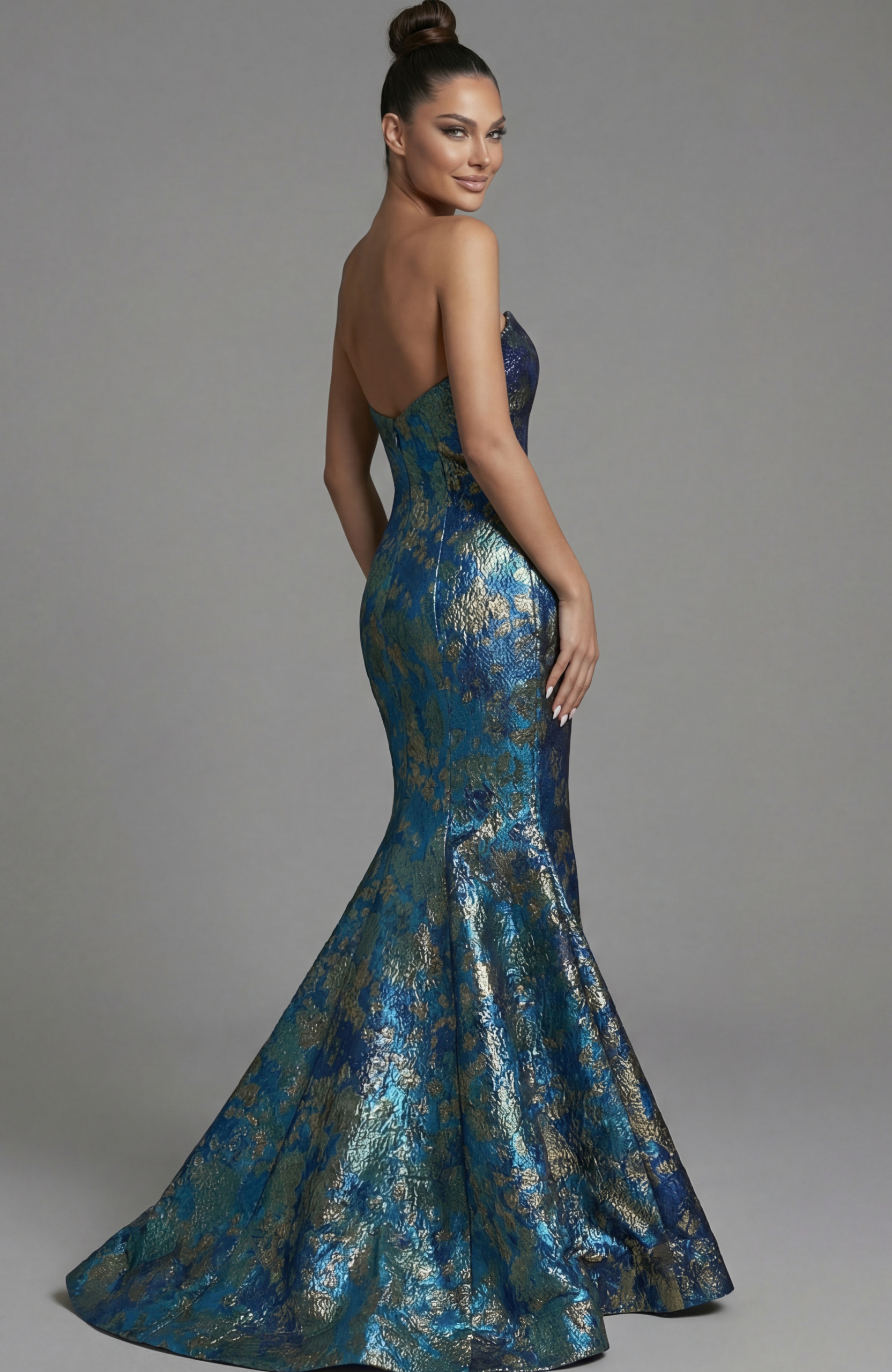 Brocade mermaid gown with fitted waist and dramatic flare back view
