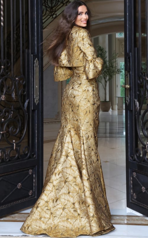 Gold metallic textured mermaid gown with bell-sleeve jacket bodice, back view