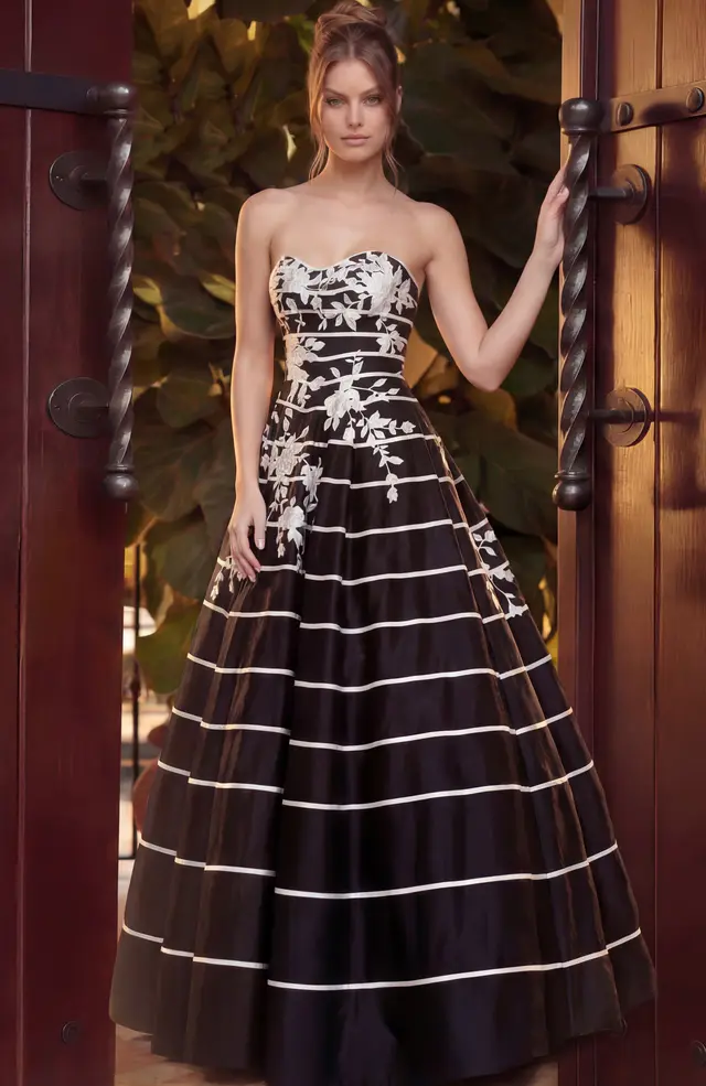 Black and white striped taffeta ball gown with floral appliques and strapless sweetheart bodice
