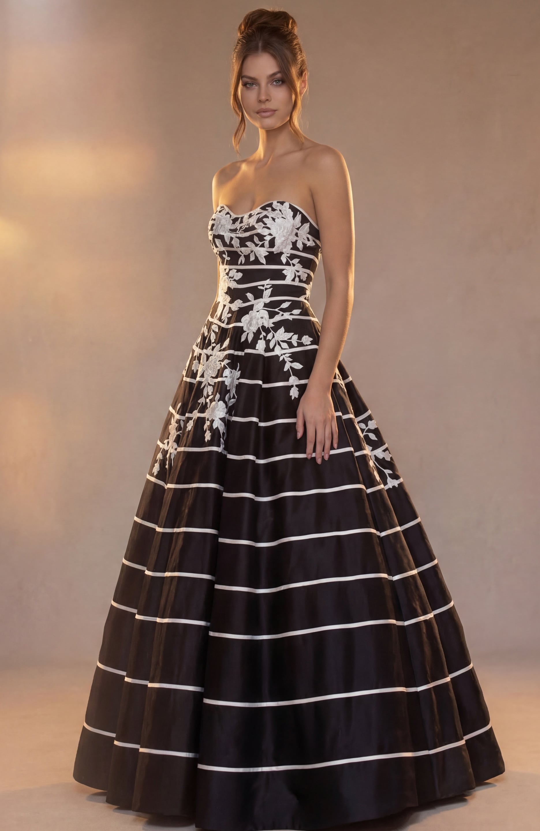 Close front view of striped ball gown showing white floral appliques on the bodice
