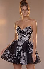 strapless dress featuring a mix of bold floral sketches and ethereal shadowed prints.
