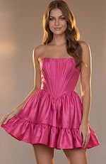 Hot pink satin cocktail dress with a strapless sweetheart-style corset top and a voluminous ruffled bottom.