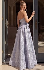back view of fitted prom dress with open back and thin straps