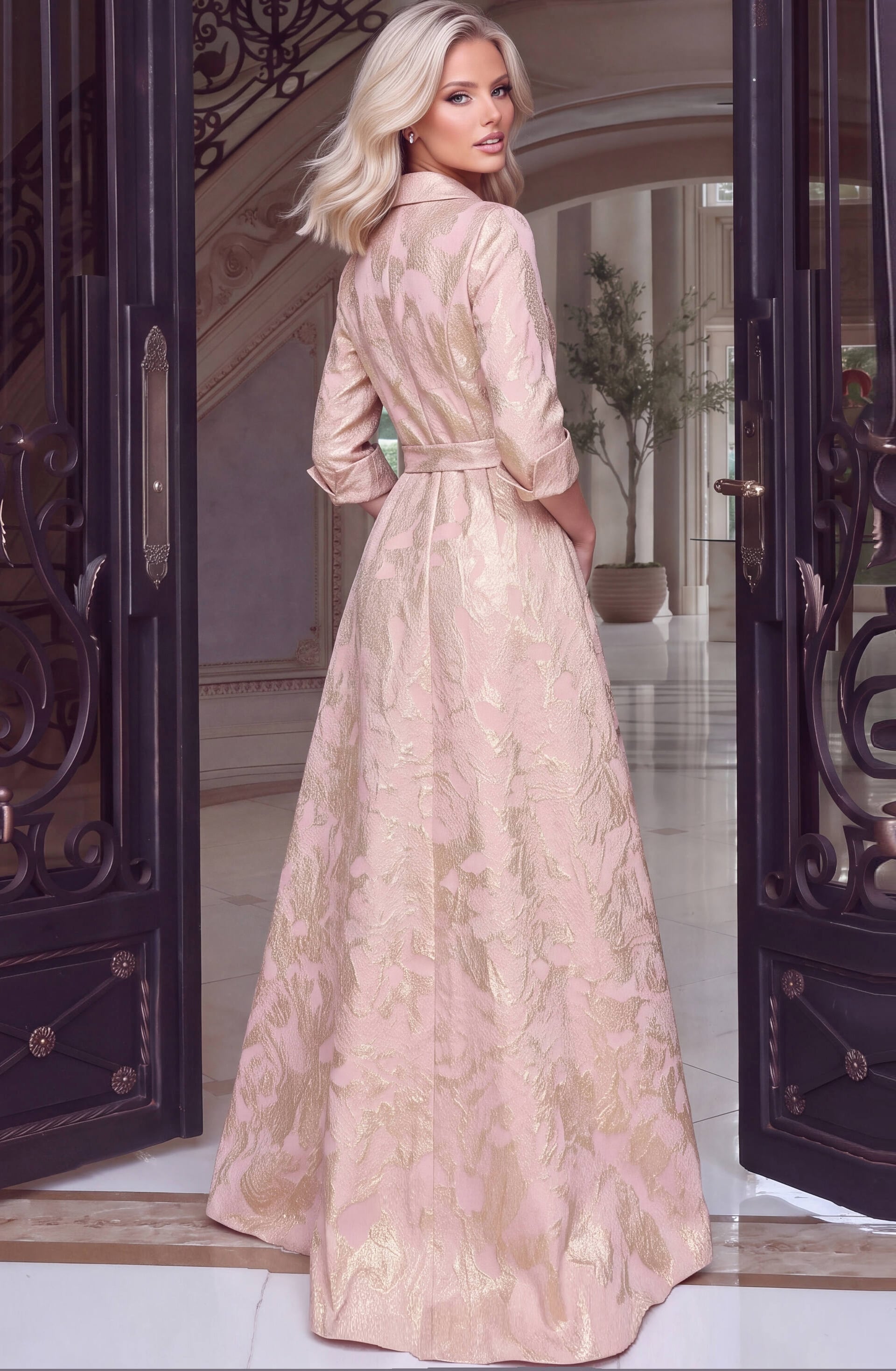 Collared neckline and long A-line skirt on a rose gold jacquard gown, shot from the back