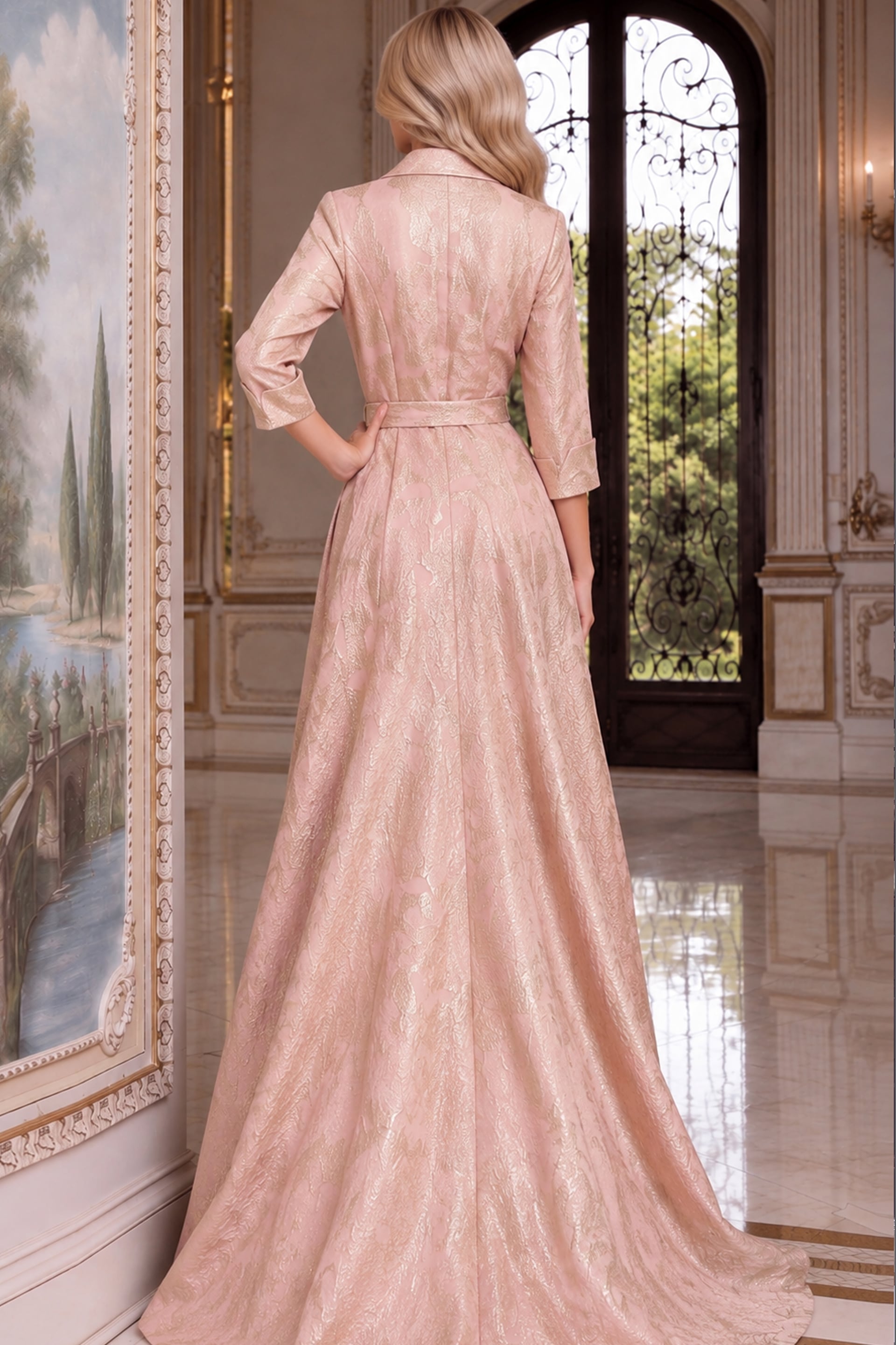 Champagne blush jacquard gown from the back, belted waist above a trained floor-length skirt