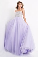 Model wearing Jovani 52131, a lilac strapless gown with a sparkling bodice and tulle skirt.
