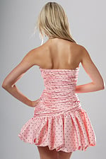 back view of pink rhinestone ruched strapless short homecoming dress with sweetheart neckline and bubble hem, Jovani style 52226