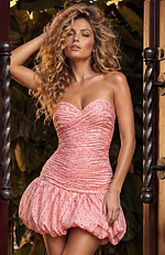 odycon-to-flare dress blending a tightly gathered ruched top with a high-volume, puffed-out bubble skirt.