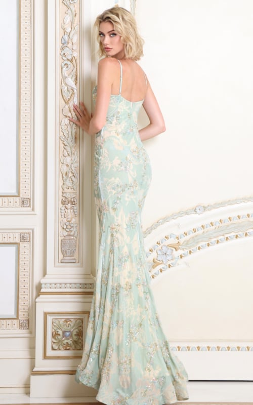Back view of mint beaded gown showing strap back and sweep train