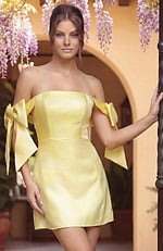 formal gown back view with metallic shine and clean lines