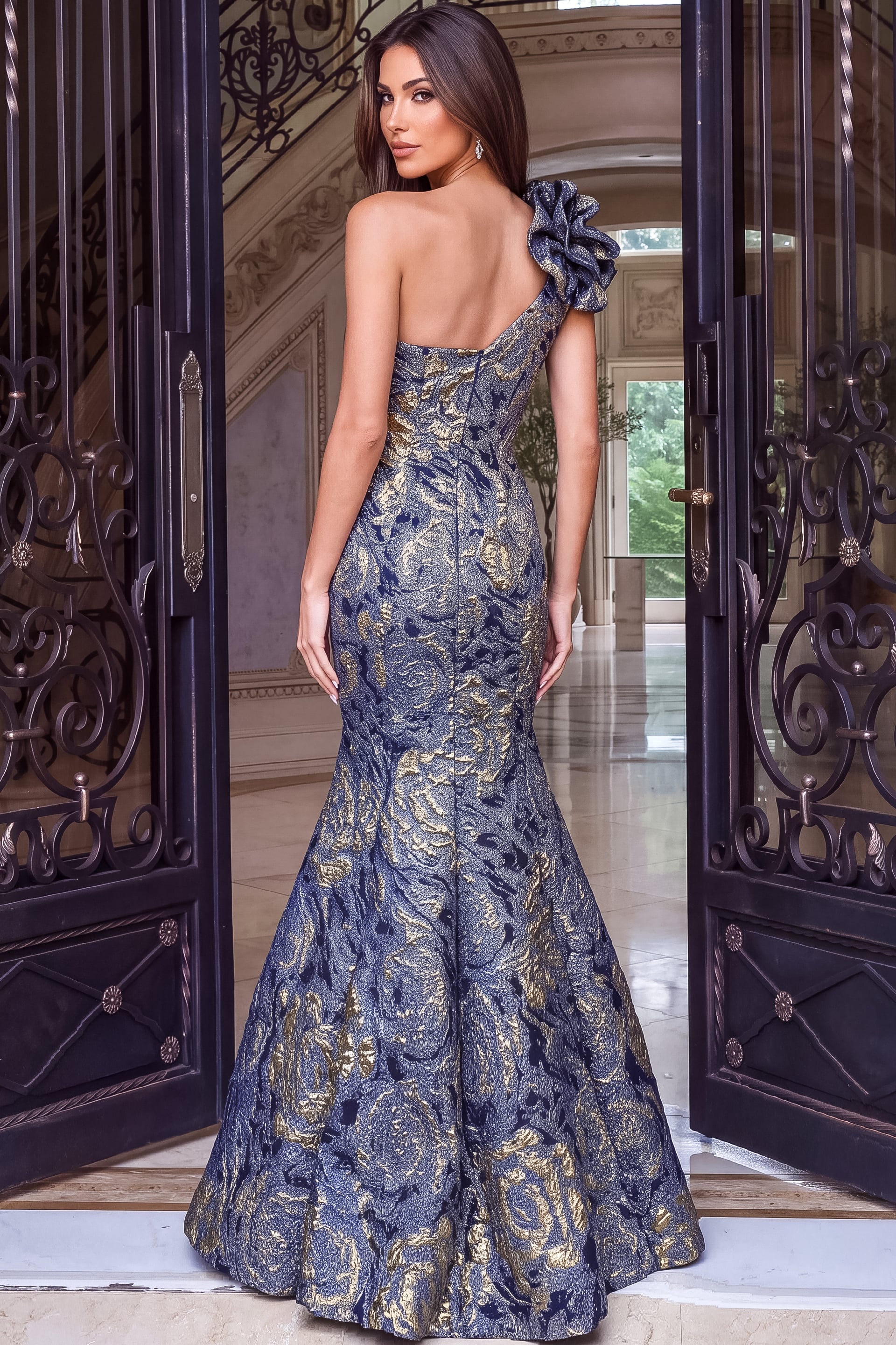 brocade gown with a sweetheart neckline, oversized floral shoulder detail, and dramatic mermaid silhouette.