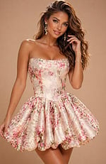 Strapless garden-style dress designed with a reinforced bodice and a short, balloon-style skirt for a modern look.