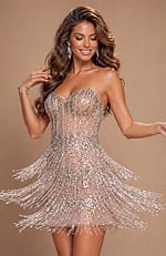strapless dress blending a structured beaded torso with a voluminous, movement-heavy fringe bottom.