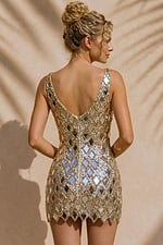 back view of gold mirror tile strapless mini dress