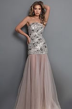 silver gown with a strapless neckline, ornate floral beadwork, and a sheer layered tulle