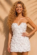 white strapless mini dress with three dimensional floral applique and rhinestone centers
