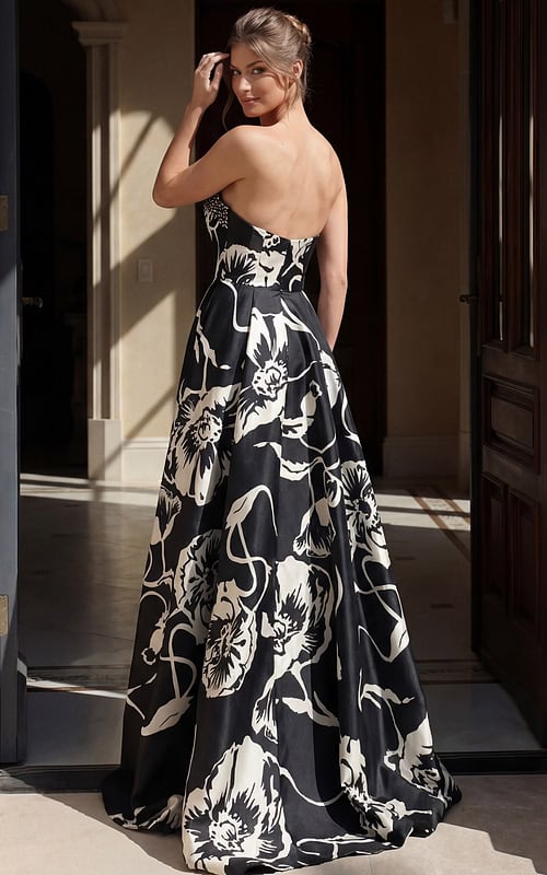 back view of black and white floral print strapless ball gown