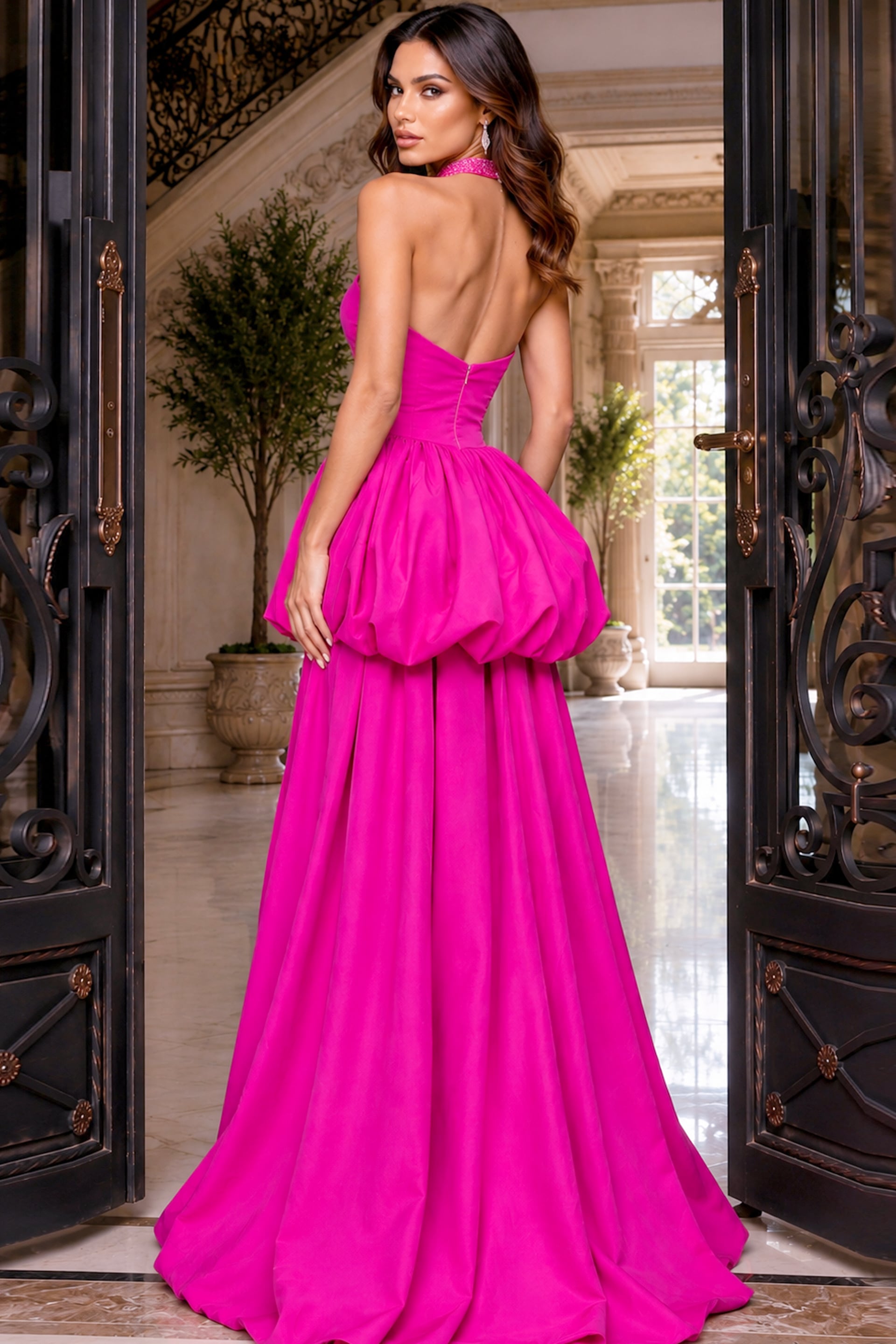 Bubble peplum and beaded choker on a fuchsia strapless gown, photographed to show the open back