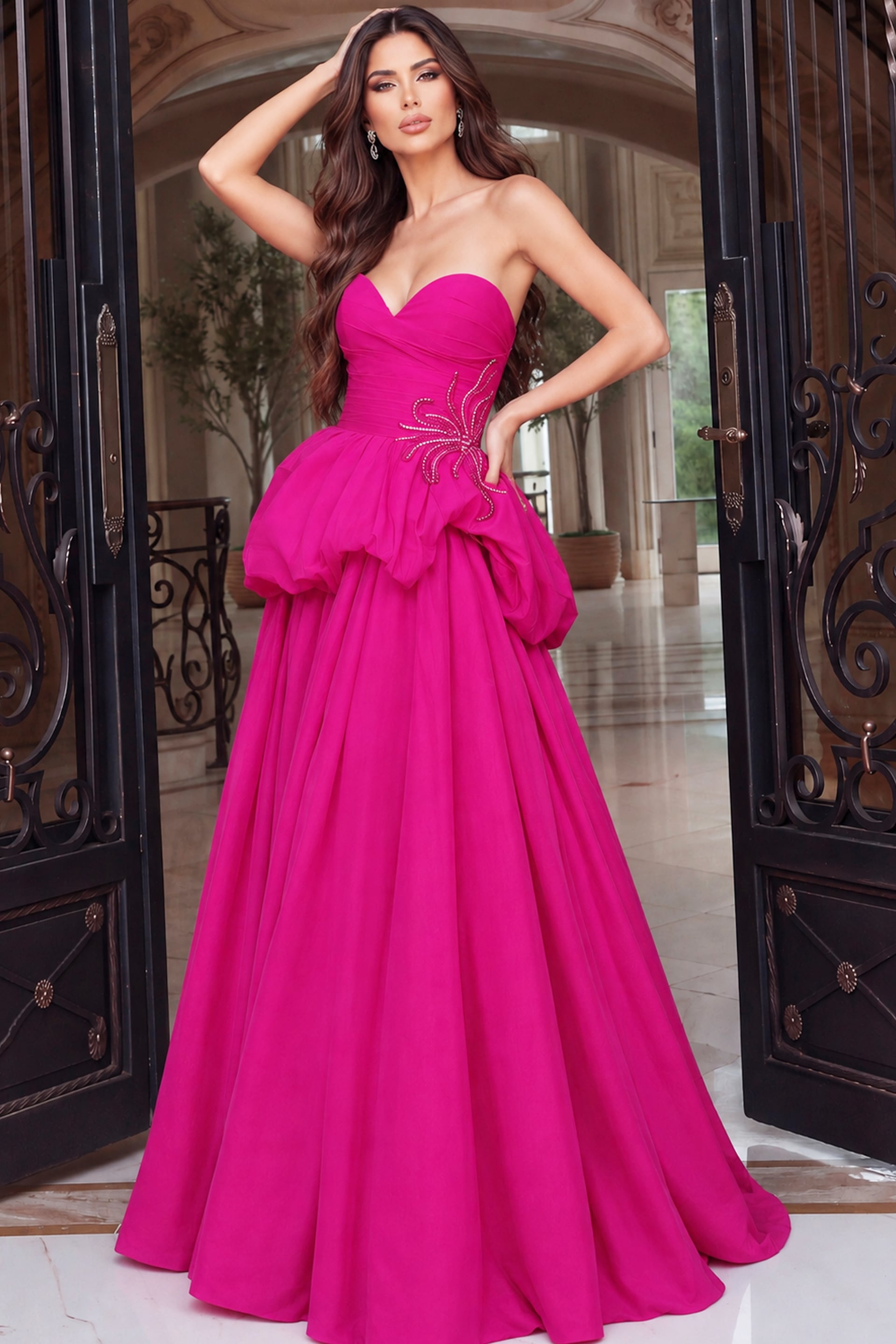 Blonde model glancing over her shoulder, magenta gown with open back and bubble peplum