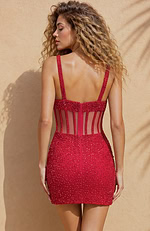 Chic mini dress featuring a tailored fit through the hips and a bold, celebratory aesthetic in a high-shine finish