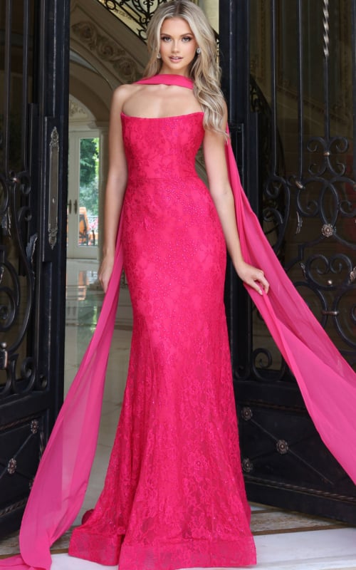 Fuchsia lace strapless gown with flowing chiffon cape at the neck, front view