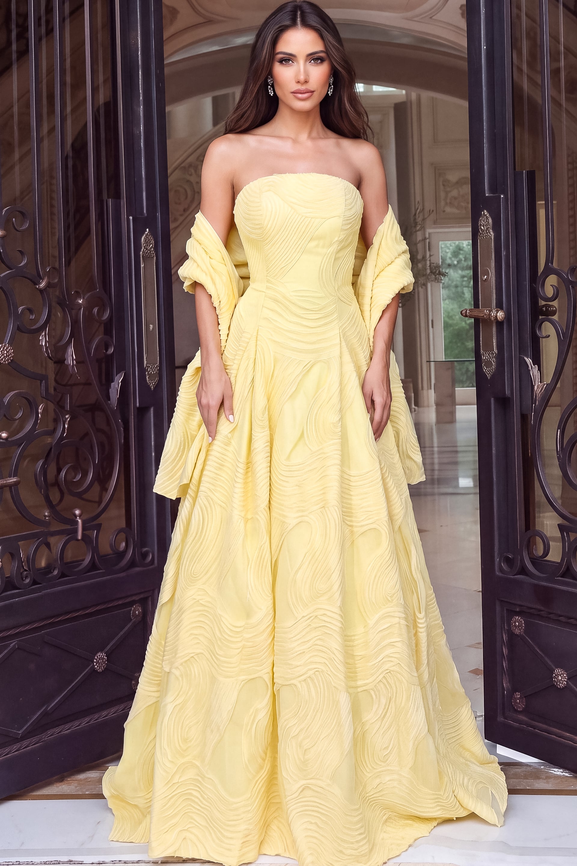 Light yellow textured ball gown with a straight neckline and wide off-shoulder drape