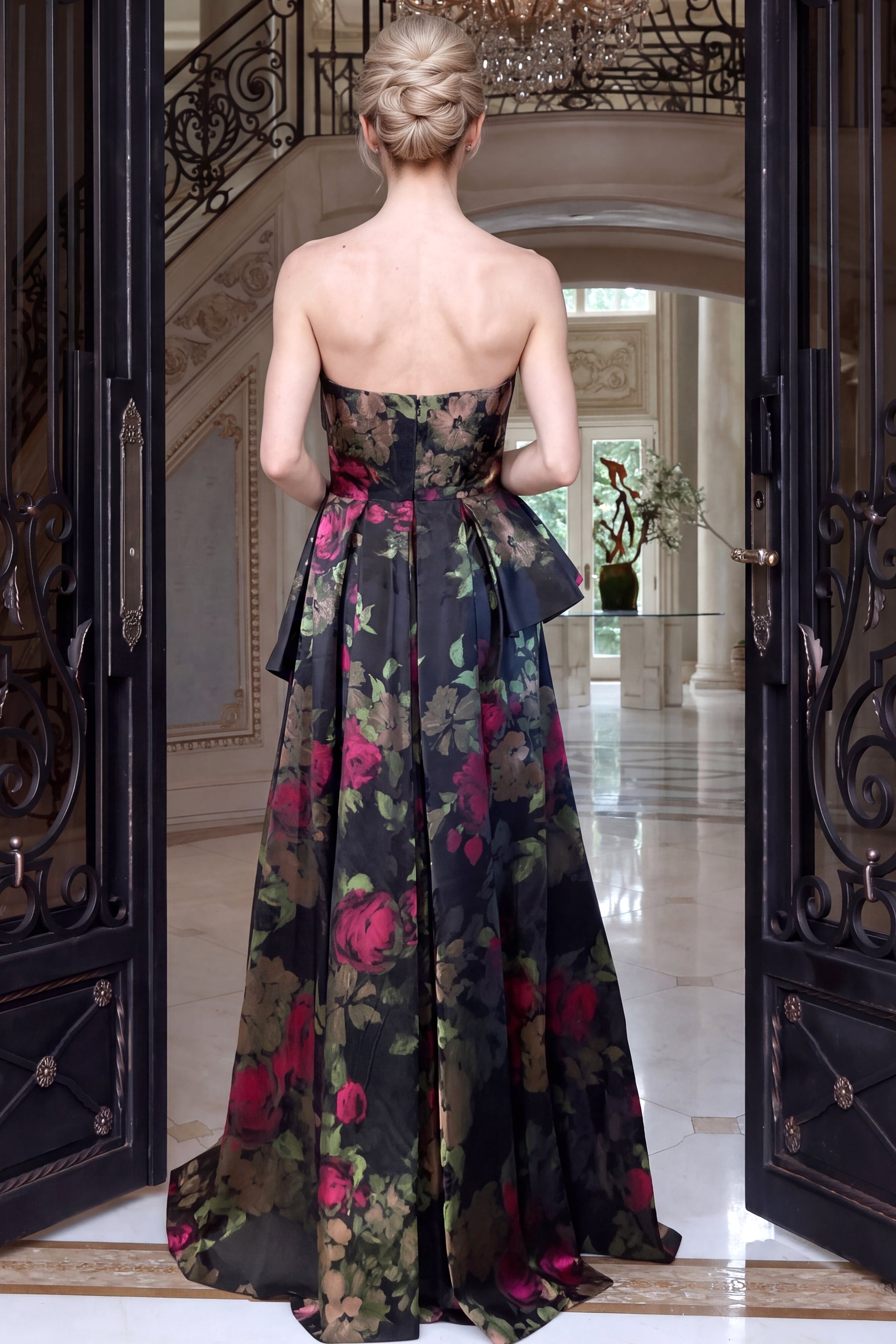 Wide pleated ball skirt viewed from the rear beneath a strapless floral bodice