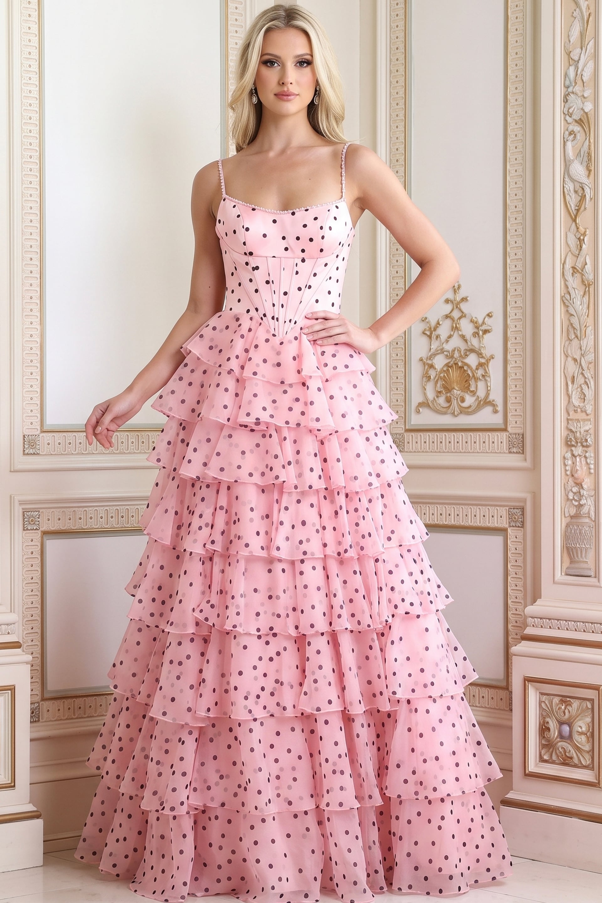 Close front view of pink polka dot tulle ball gown showing the boned corset bodice