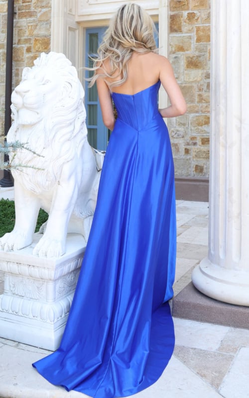 back view of royal blue satin corset gown with sweep train