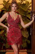 Short red prom dress with shimmering sequins, fringe skirt, and flattering wrap bodice