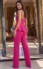 back view of strapless prom dress with open back and layered tulle skirt