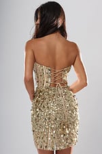 back view of nude gold paillette sequin strapless corset short homecoming dress with sweetheart neckline and sheer boned bodice, Jovani style 53770