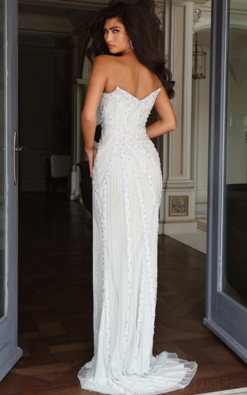 back view of mint beaded column gown with covered strapless back and sheer tulle train 54075