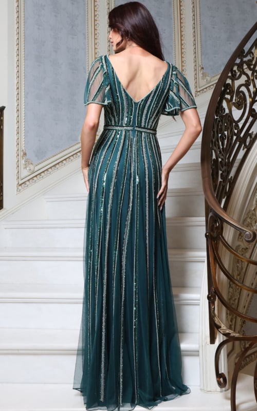Emerald green beaded gown with V-back and flutter sleeves, back view